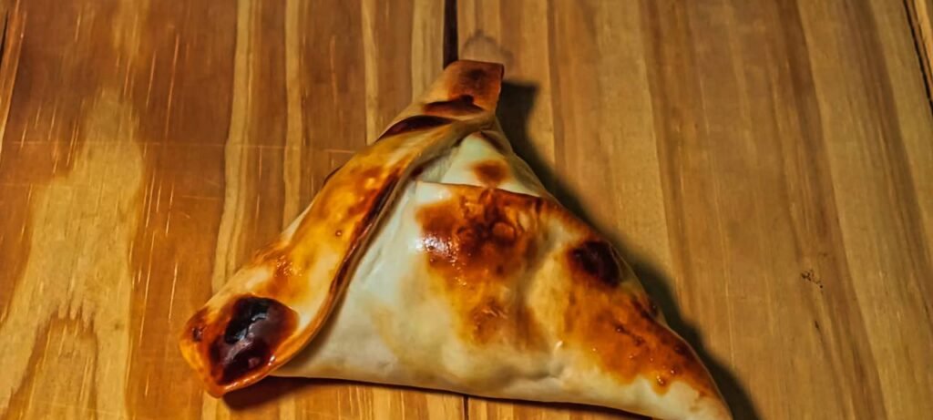 Esfiha fechada: quanto custa fazer em casa para a família - Imagem do artigo